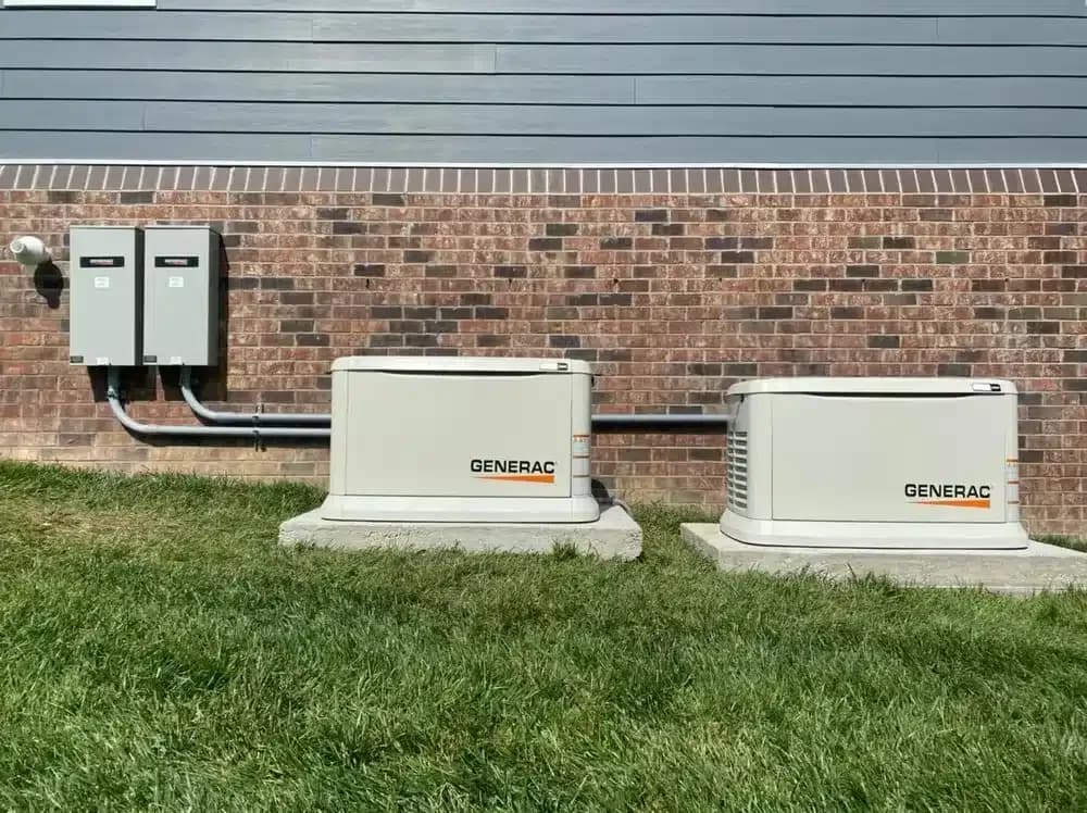Two Generac generators outside of a residential home in Lexington, KY