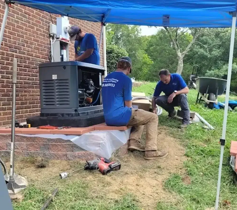 Technicians working on generator in Lexington