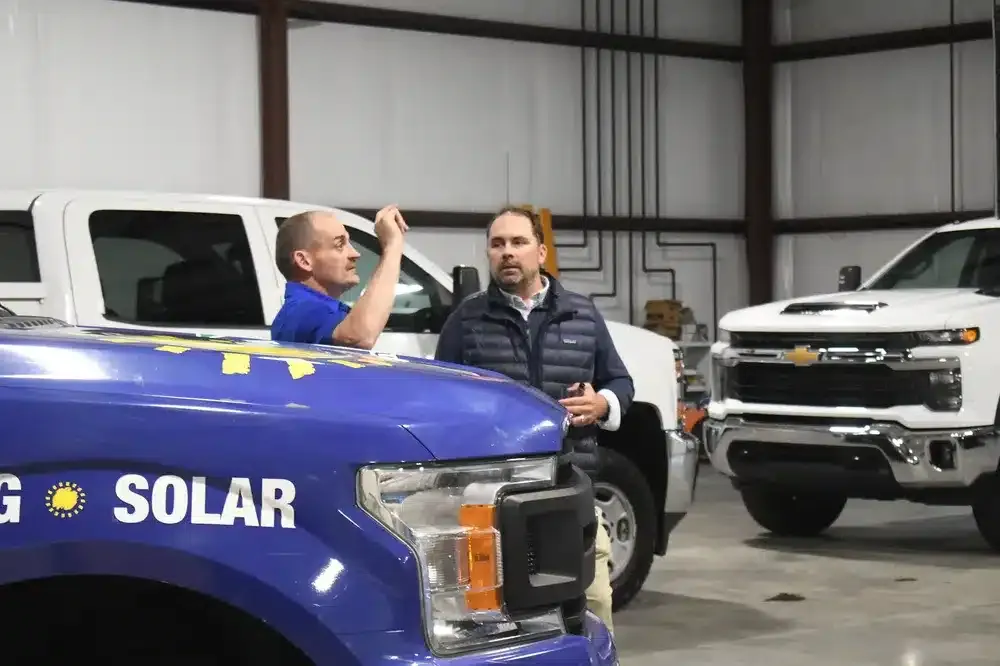 Technicians talking on opening day