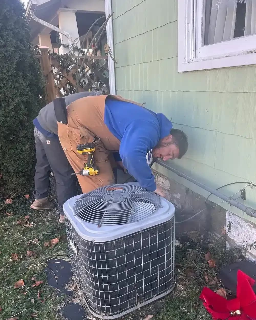 Technician working on Air Conditioner in Lexington