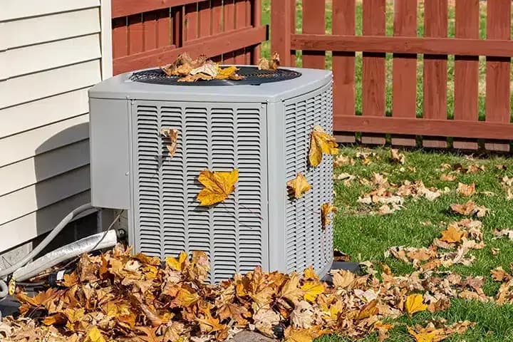 Air conditioner with leaves falling in Lexington KY