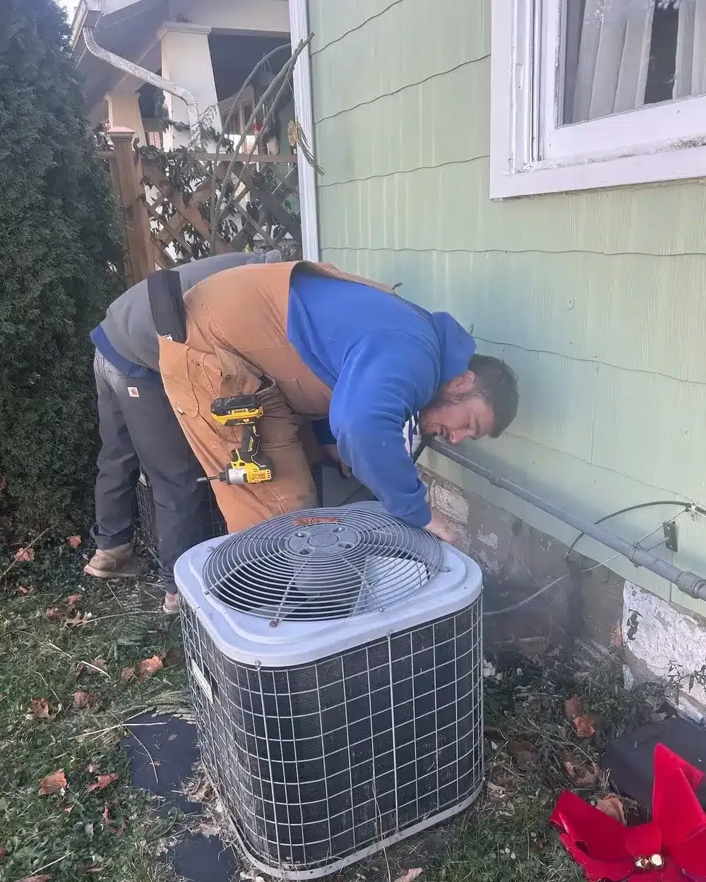 Technician working on Air Conditioner in Lexington
