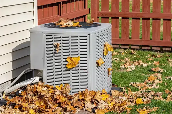 Air conditioner with leaves falling in Lexington KY
