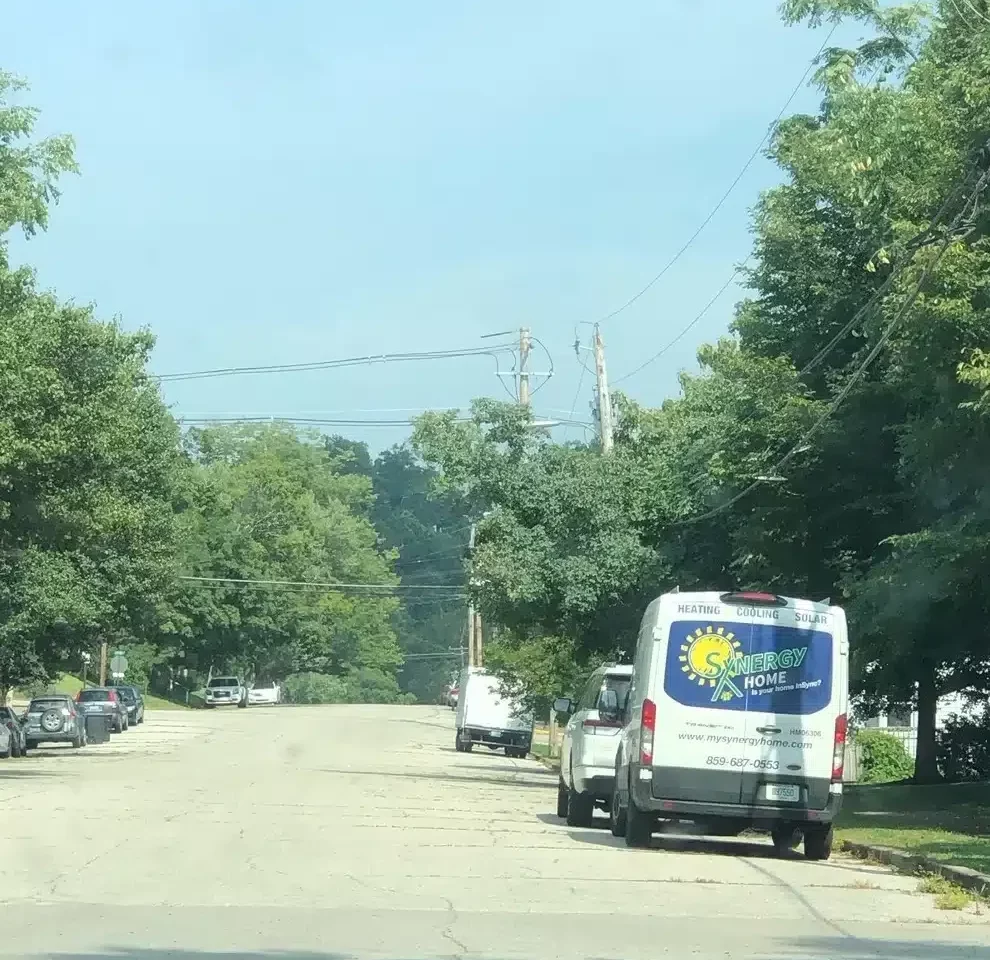 Back of Synergy van parked on street in Lexington, KY.