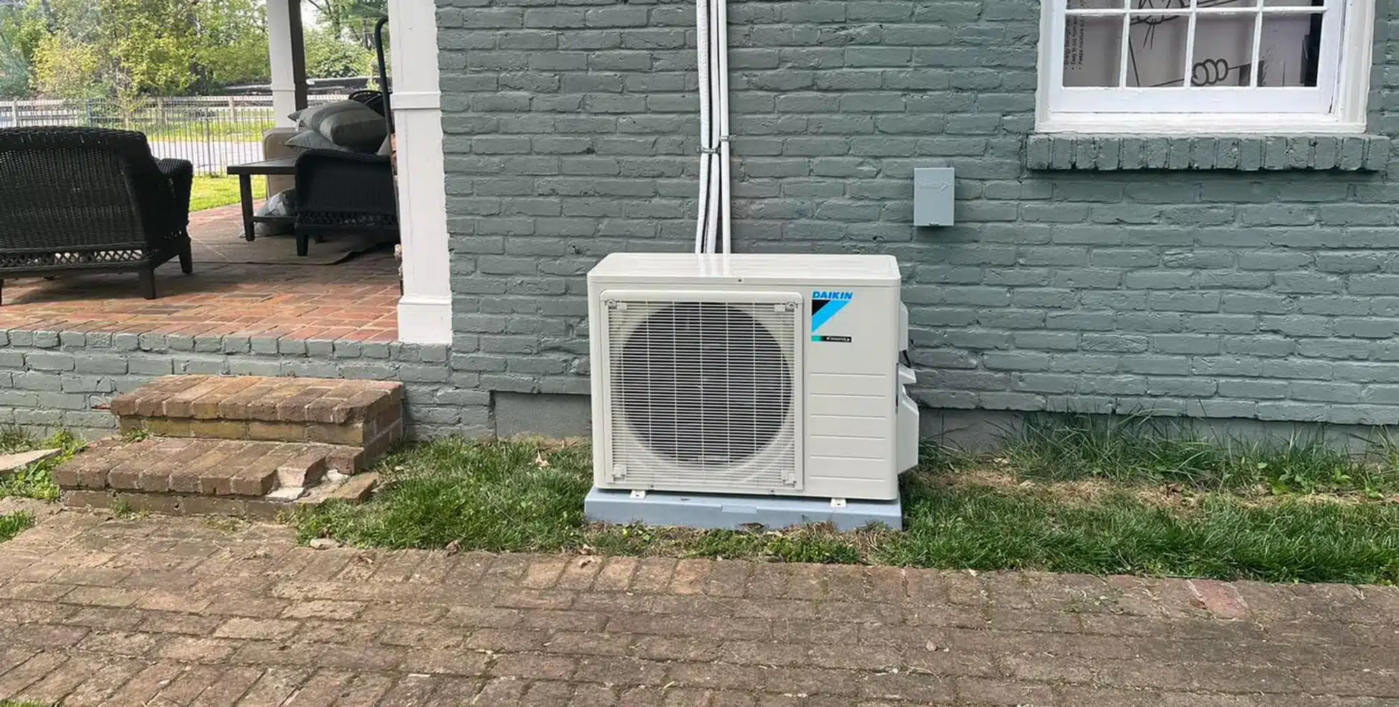 Heat pump outside of residential home in Lexington, KY.