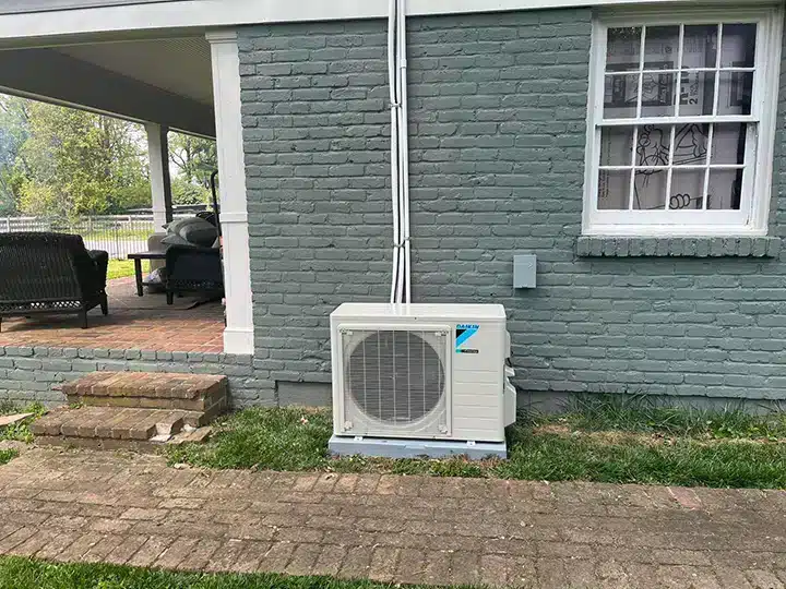 Heat pump outside of residential home in Lexington, KY.